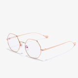Hypreader Aquila Blaulichtfilterbrille mit transparenten Gläsern und goldfarbenem in rose achteckigem Metallgestell – Seitenansicht schräg von vorne