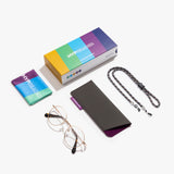 Lieferumfang der Hypreader Phoenix Brille in Roségold mit Etui, Brillenband, Reinigungstuch und bunter Verpackung – funktional und stilvoll zugleich.