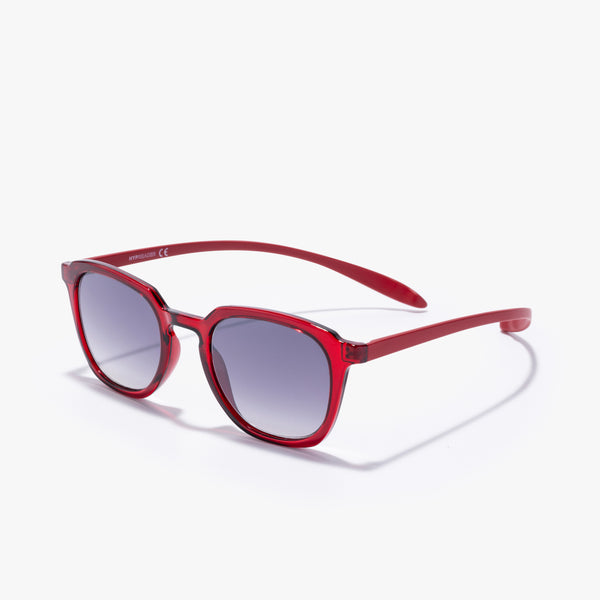 Hypreader Orion Sonnenbrille in transparentem Rot, schräg fotografiert mit Verlaufsgläsern in Grau