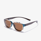 Hypreader Pyxis Sonnenclip Braun in schräger Seitenansicht – stilvoller Clip mit warm getönten Gläsern auf transparent-blauer Brille.