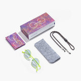 Hypreader Vela Gelb Sonnenbrille mit Zubehör: Filzetui, Brillenband, Putztuch und bunte Verpackung auf weißem Hintergrund